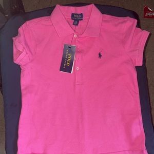 I’m selling a girl polo dress , brand new pink